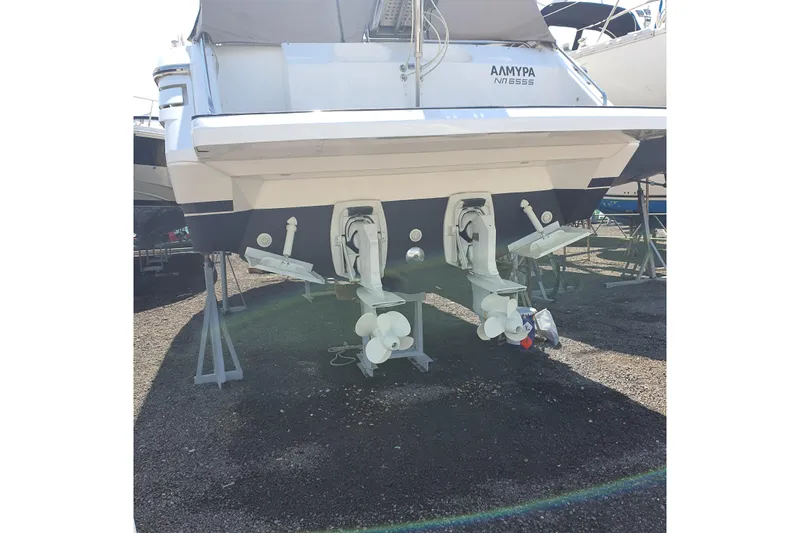  Yacht Photos Pics Rear view of 1993 Princess 366 Riviera boat with dual propellers on dry dock.