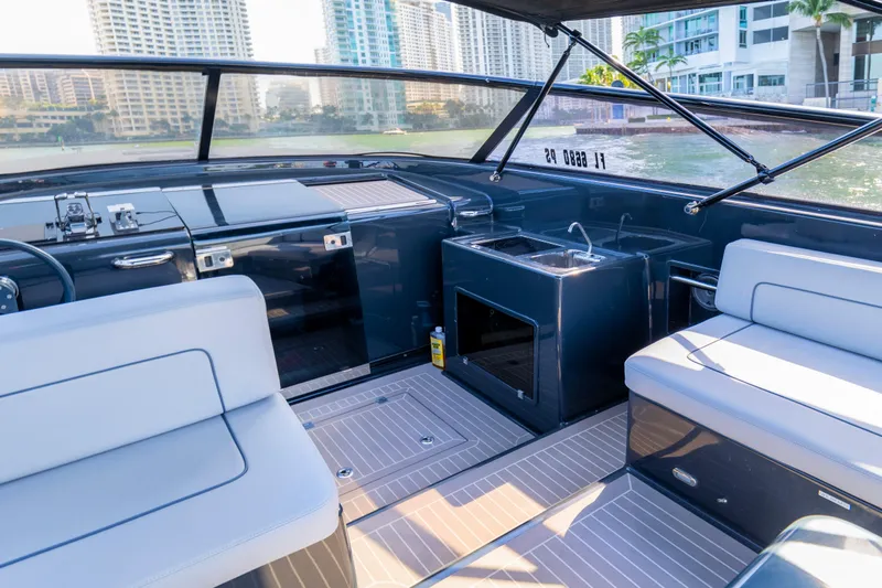 Drakaris Yacht Photos Pics Interior of 2014 VanDutch 40 yacht with modern seating and sleek design.