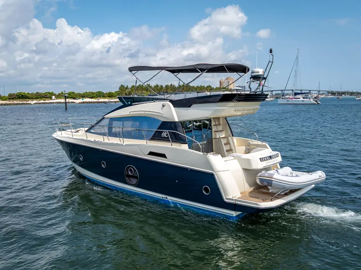 Good Deeds Yacht Photos Pics 2015 Beneteau Monte Carlo 5 yacht cruising on a sunny day.