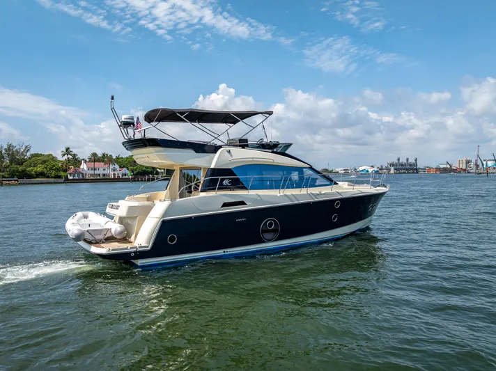 Good Deeds Yacht Photos Pics 2015 Beneteau Monte Carlo 5 yacht cruising on a sunny day.