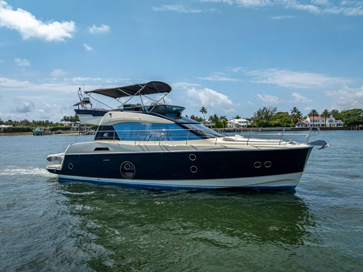 Good Deeds Yacht Photos Pics 2015 Beneteau Monte Carlo 5 yacht cruising on a sunny day.