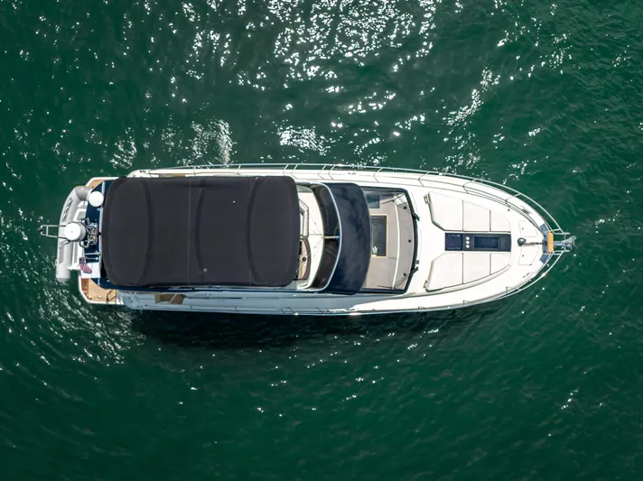 Good Deeds Yacht Photos Pics Overhead view of 2015 Beneteau Monte Carlo 5 yacht on water.