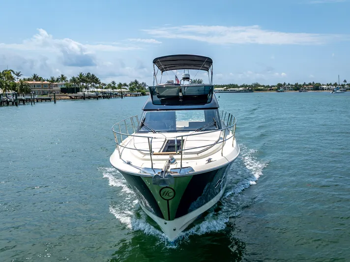 Good Deeds Yacht Photos Pics 2015 Beneteau Monte Carlo 5 yacht cruising on a sunny day.