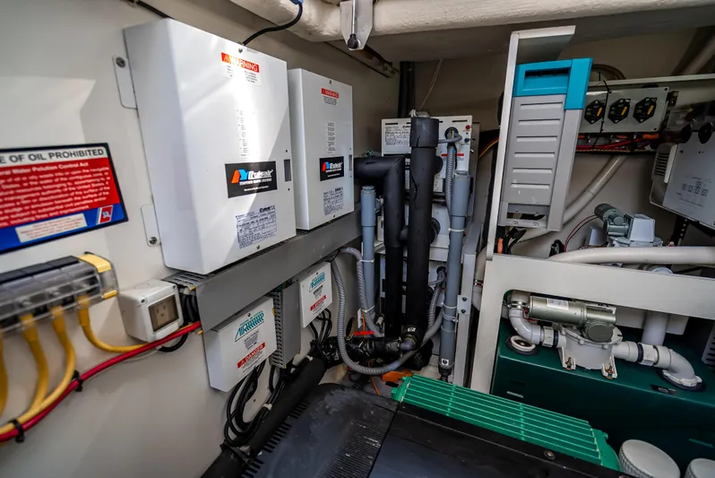 Good Deeds Yacht Photos Pics Engine room of 2015 Beneteau Monte Carlo 5, showcasing electrical systems and components.