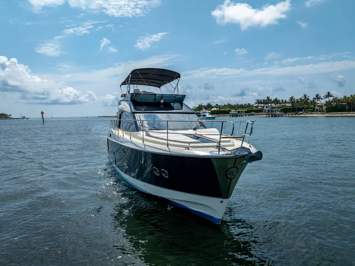 Good Deeds Yacht Photos Pics 2015 Beneteau Monte Carlo 5 yacht cruising on a sunny day.