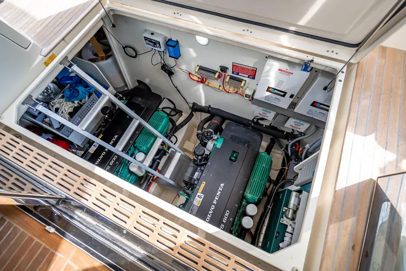 Good Deeds Yacht Photos Pics Engine room of 2015 Beneteau Monte Carlo 5 yacht, showcasing dual engines and electrical systems.