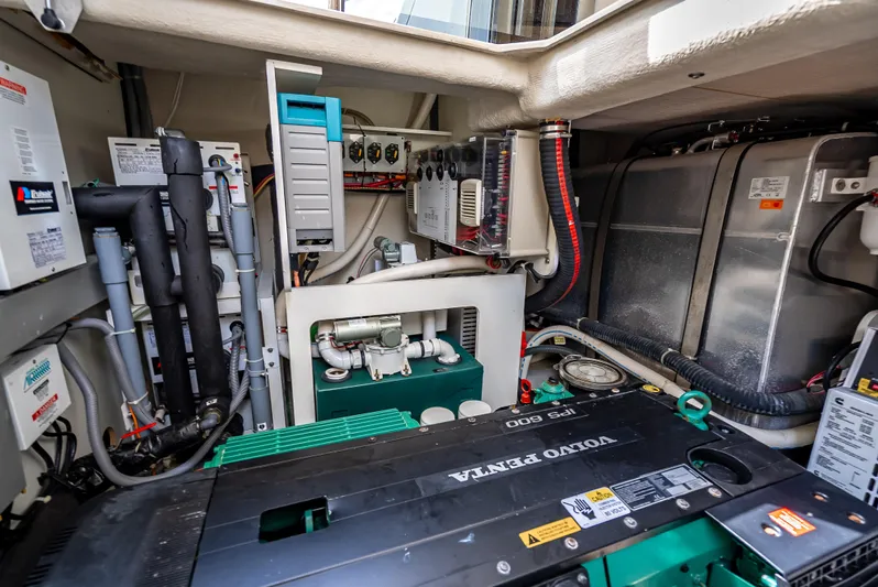 Good Deeds Yacht Photos Pics Engine room of 2015 Beneteau Monte Carlo 5 yacht, featuring Volvo Penta components.