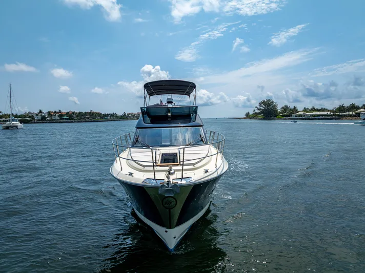 Good Deeds Yacht Photos Pics 2015 Beneteau Monte Carlo 5 yacht cruising on a sunny day.