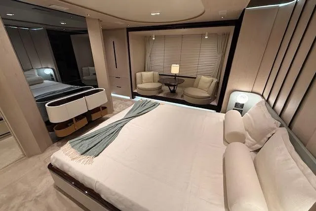  Yacht Photos Pics Luxurious bedroom interior of 2022 Azimut GRANDE 25 METRI yacht with modern furnishings.