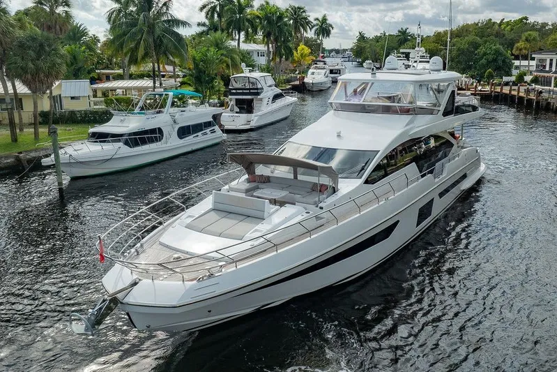  Yacht Photos Pics Luxury Azimut GRANDE 25 METRI yacht, 2022 model, cruising in a scenic waterway.