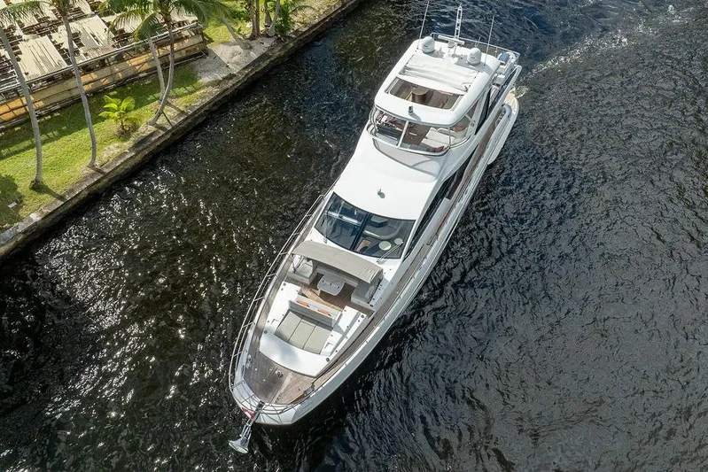  Yacht Photos Pics Aerial view of 2022 Azimut GRANDE 25 METRI yacht cruising on a river.