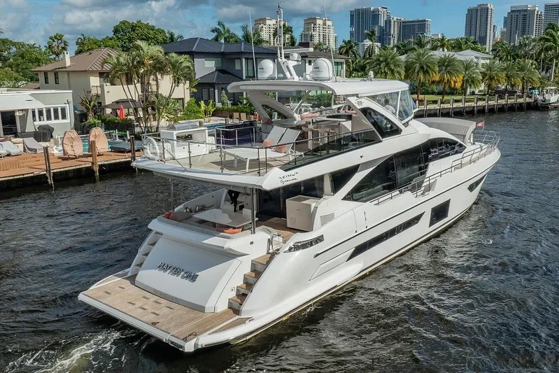  Yacht Photos Pics Luxury Azimut GRANDE 25 METRI yacht cruising near waterfront homes, 2022 model.
