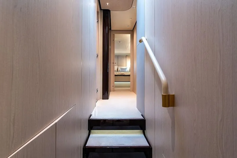  Yacht Photos Pics Interior hallway of 2022 Azimut GRANDE 25 METRI yacht, featuring modern design and lighting.
