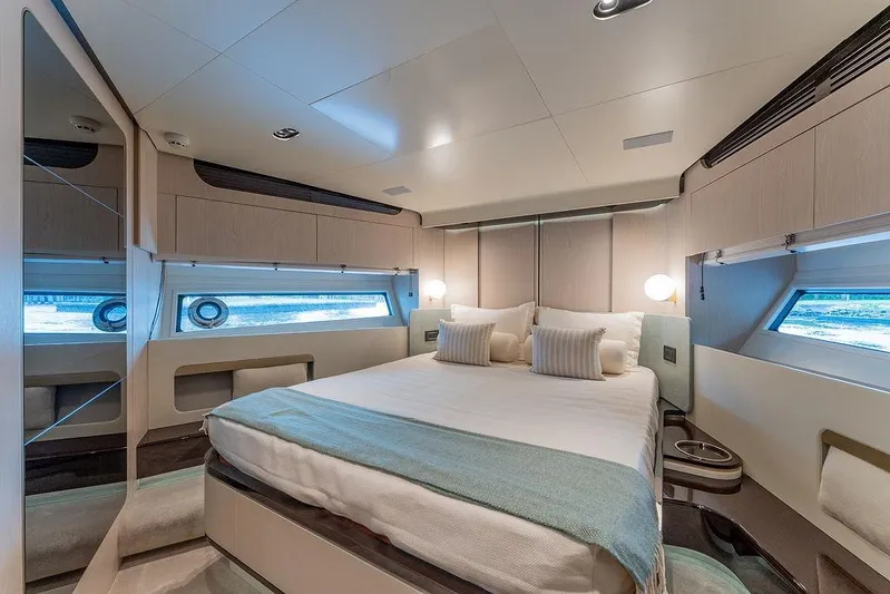  Yacht Photos Pics Luxurious bedroom interior of 2022 Azimut GRANDE 25 METRI yacht, featuring modern design and elegant decor.
