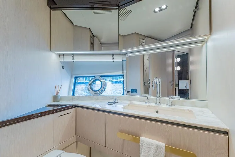  Yacht Photos Pics Luxurious bathroom interior of 2022 Azimut GRANDE 25 METRI yacht with modern fixtures.