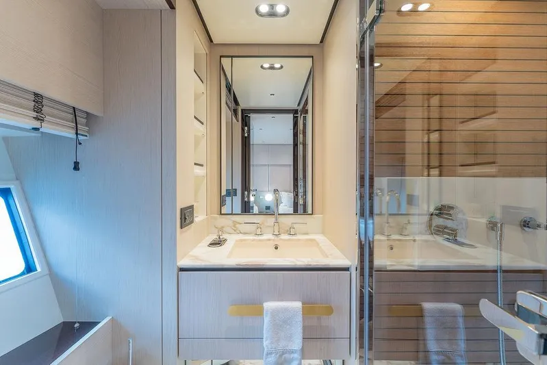  Yacht Photos Pics Luxurious bathroom in 2022 Azimut GRANDE 25 METRI yacht, featuring modern fixtures and elegant design.
