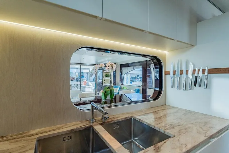  Yacht Photos Pics Luxurious kitchen interior of 2022 Azimut GRANDE 25 METRI yacht with modern design.