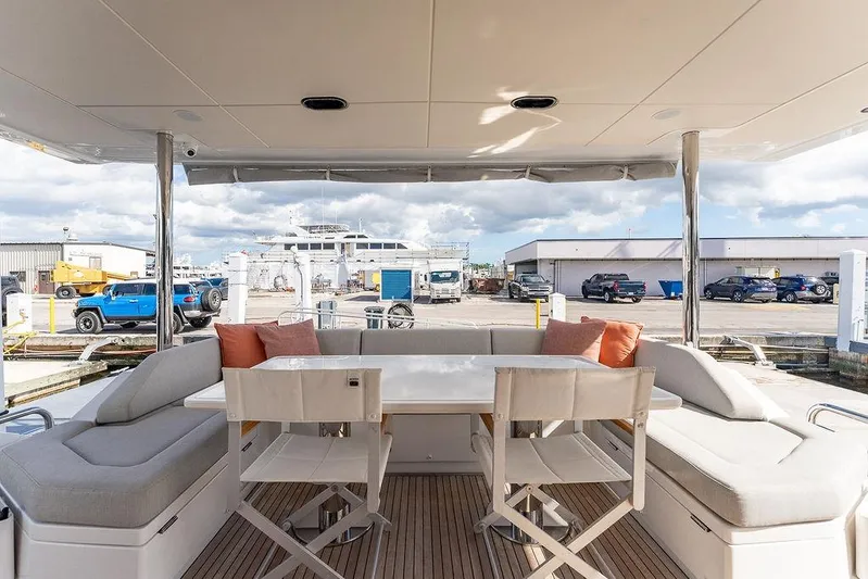  Yacht Photos Pics Luxury Azimut GRANDE 25 METRI yacht deck with seating, 2022 model, docked at marina.