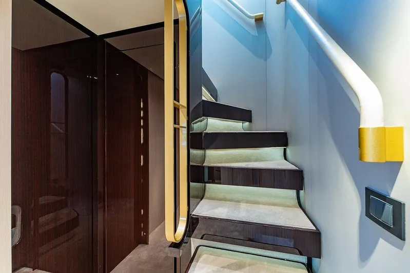  Yacht Photos Pics Luxurious staircase on 2022 Azimut GRANDE 25 METRI yacht, featuring modern design and elegant finishes.