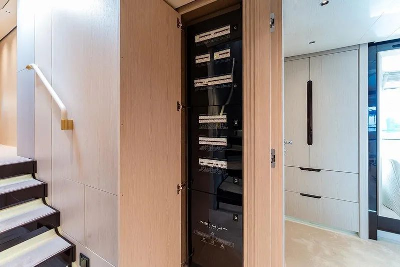  Yacht Photos Pics Electrical panel inside 2022 Azimut GRANDE 25 METRI yacht, featuring modern interior design.