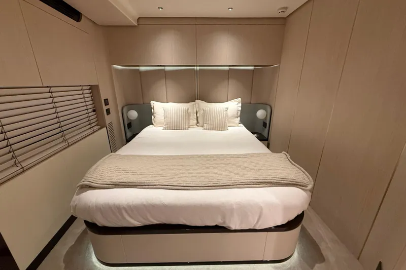  Yacht Photos Pics Luxurious bedroom interior of 2025 Azimut Yachts 25 Metri Grande, featuring elegant design.