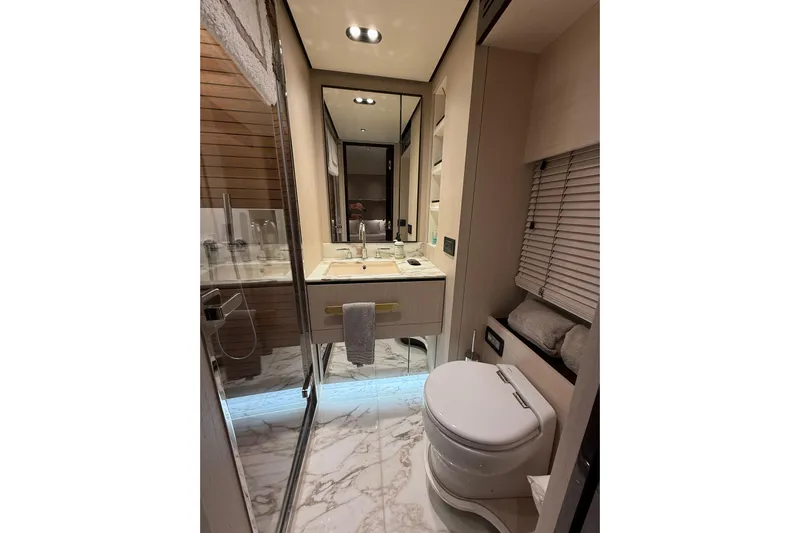  Yacht Photos Pics Luxurious bathroom in 2025 Azimut 25 Metri Grande yacht with modern fixtures and elegant design.