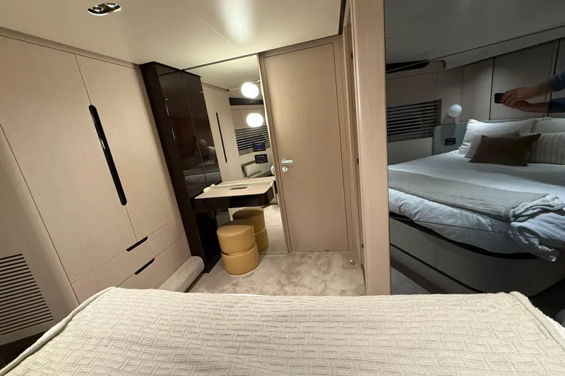  Yacht Photos Pics Luxurious interior of 2025 Azimut Yachts 25 Metri Grande, featuring elegant bedroom and modern furnishings.