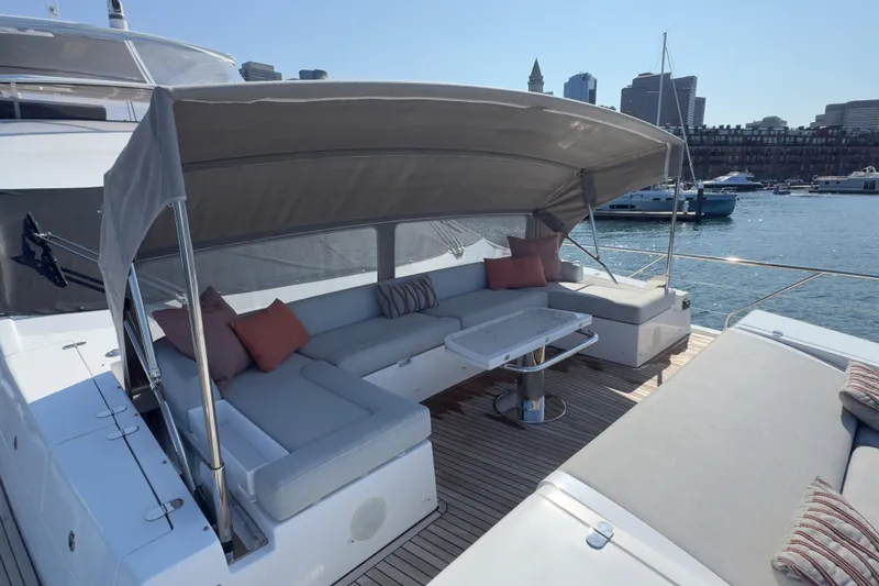  Yacht Photos Pics Luxurious 2025 Azimut 25 Metri Grande yacht with elegant outdoor seating and canopy.