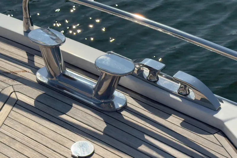  Yacht Photos Pics Deck cleat on 2025 Azimut Yachts 25 Metri Grande, reflecting sunlight over water.
