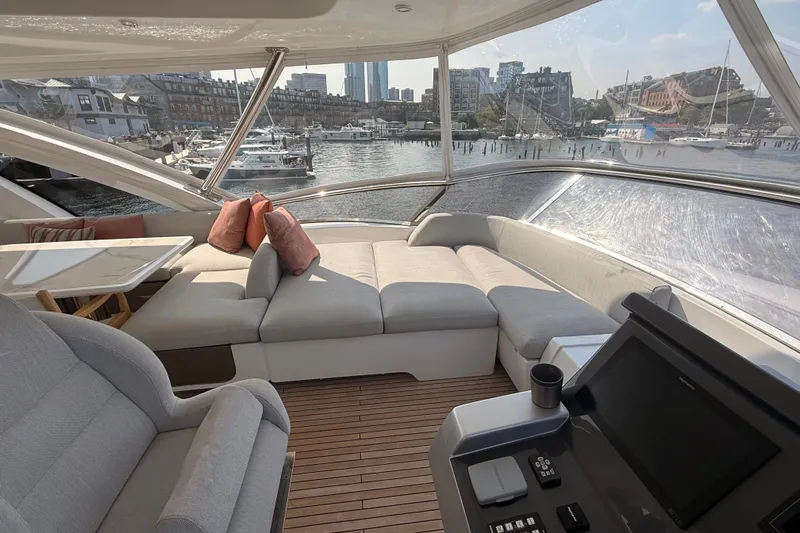  Yacht Photos Pics Luxurious interior of 2025 Azimut 25 Metri Grande yacht with spacious seating and scenic marina view.