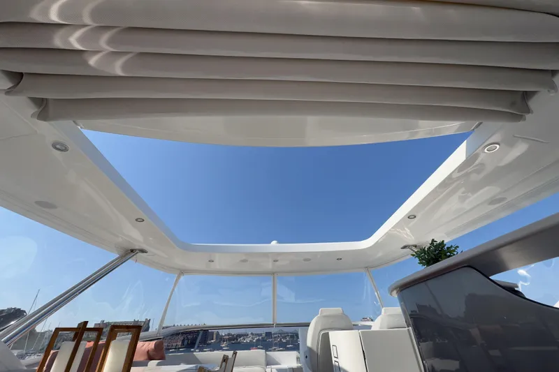  Yacht Photos Pics Luxurious interior of 2025 Azimut 25 Metri Grande yacht with open sunroof and elegant seating.