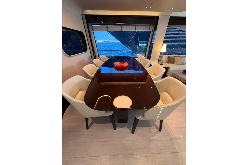  Yacht Photos Pics Luxurious dining area on 2025 Azimut 25 Metri Grande yacht with elegant seating.