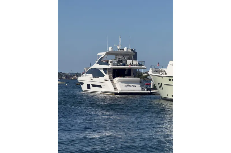  Yacht Photos Pics Luxury Azimut 25 Metri Grande yacht, 2025 model, docked in serene waters.