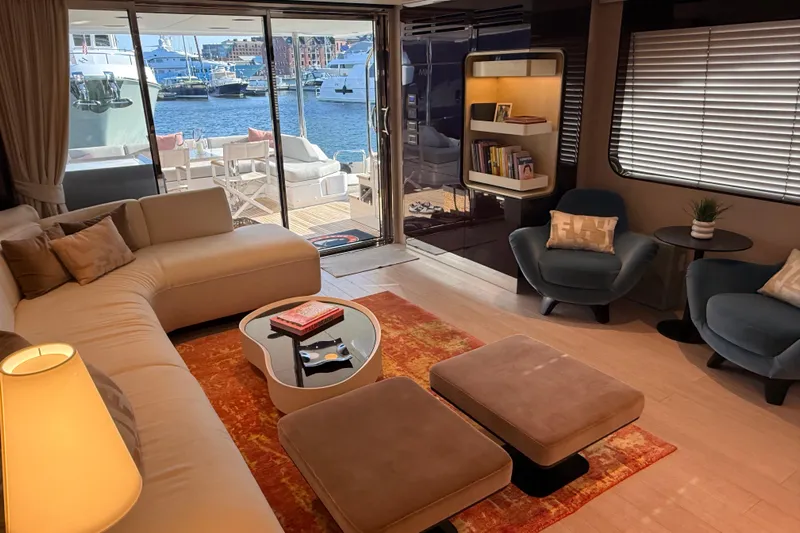 Yacht Photos Pics Luxurious interior of 2025 Azimut 25 Metri Grande yacht with elegant seating and marina view.
