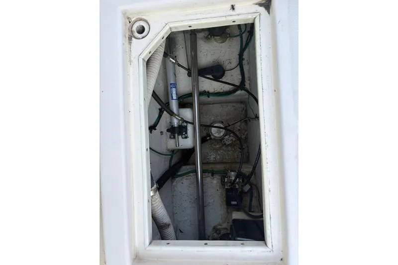  Yacht Photos Pics 2006 Carolina Classic 32 boat compartment with visible wiring and components.