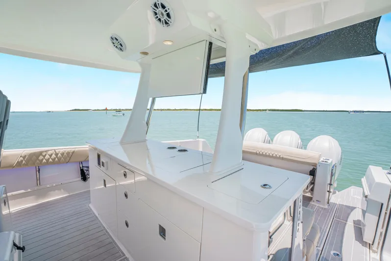 My Honey Yacht Photos Pics 2023 Regal 38 SAV yacht interior with sleek design and ocean view.