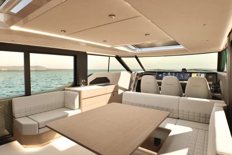  Yacht Photos Pics Luxurious interior of 2026 Saxdor 460 GTC yacht with modern seating and panoramic windows.