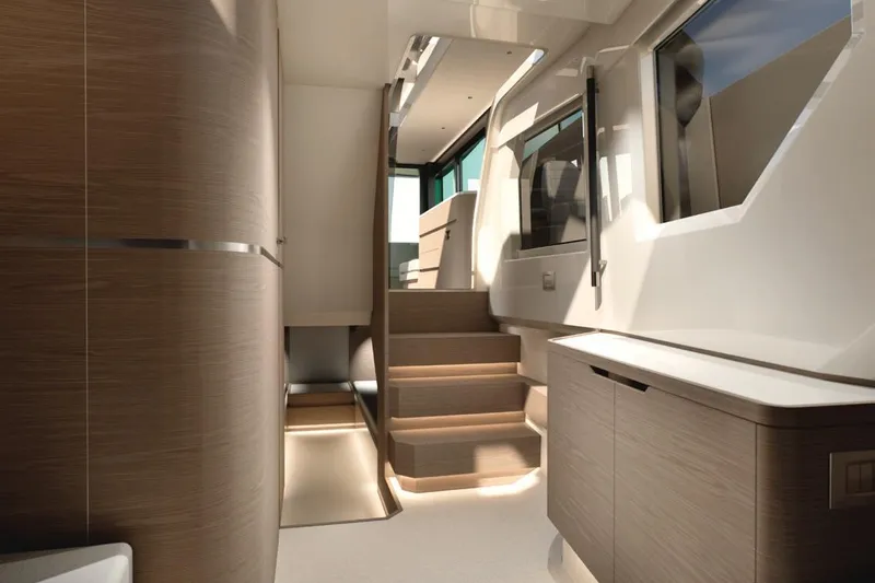  Yacht Photos Pics Luxurious interior of 2026 Saxdor 460 GTC yacht with modern wood finishes and sleek design.