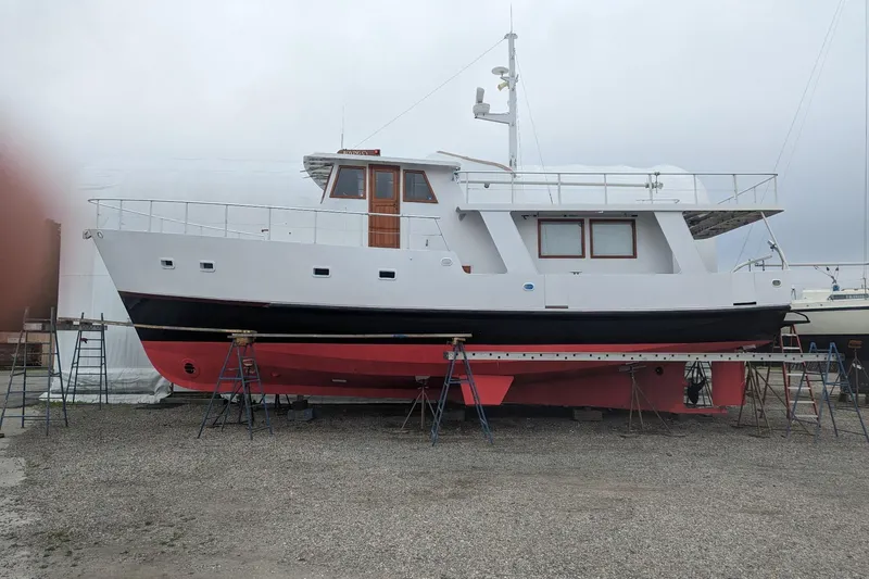  Yacht Photos Pics Custom Jack Gilbert 50 Trawler, 1999 model, on dry dock for maintenance.