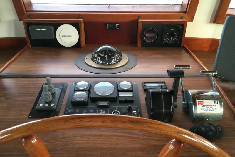  Yacht Photos Pics Control panel of a 1999 Custom Jack Gilbert 50 Trawler with navigation instruments.