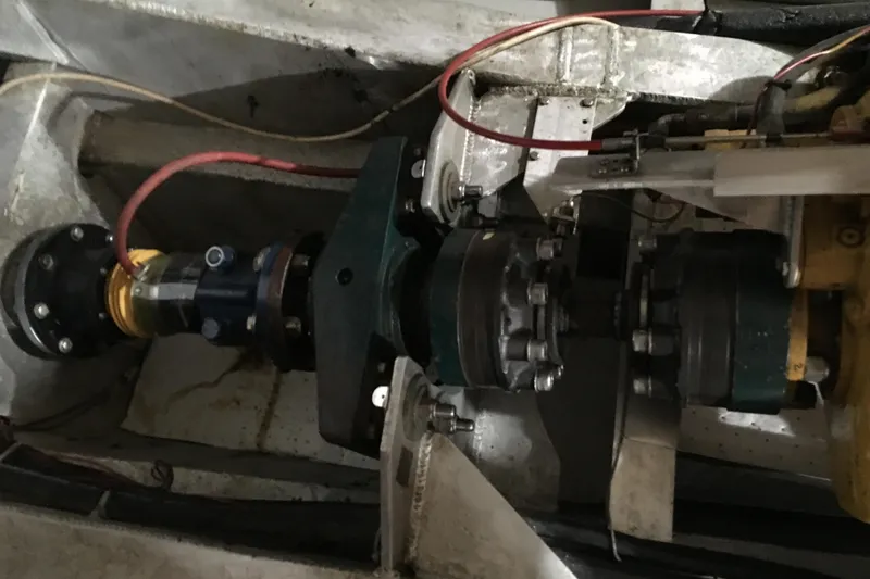  Yacht Photos Pics Engine compartment of 1999 Custom John Gilbert 50 Trawler, showcasing mechanical components.