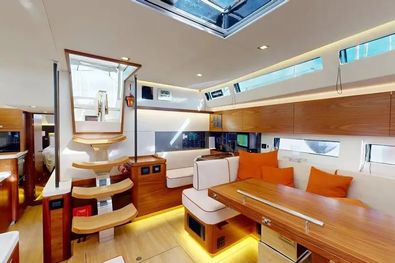 Amel 50 Yacht Photos Pics Luxurious interior of 2023 Amel 50 yacht with modern design and wooden finishes.