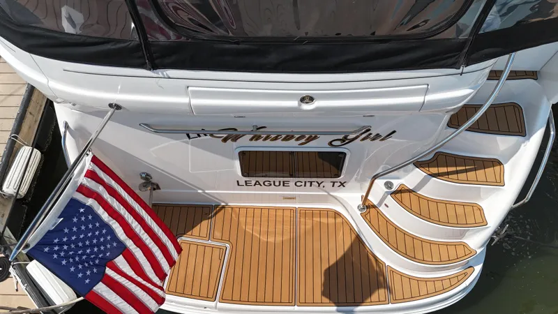 Debs Dinghy Yacht Photos Pics 2007 Sea Ray 40 Motor Yacht with American flag, docked in League City, TX.