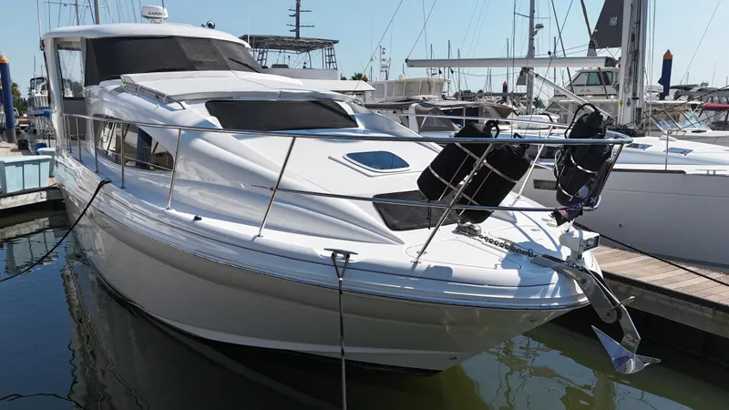 Debs Dinghy Yacht Photos Pics 2007 Sea Ray 40 Motor Yacht docked in marina, sleek design, white exterior.