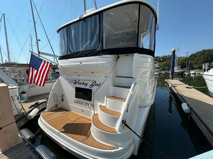 Debs Dinghy Yacht Photos Pics 2007 Sea Ray 40 Motor Yacht docked, featuring elegant design and American flag.