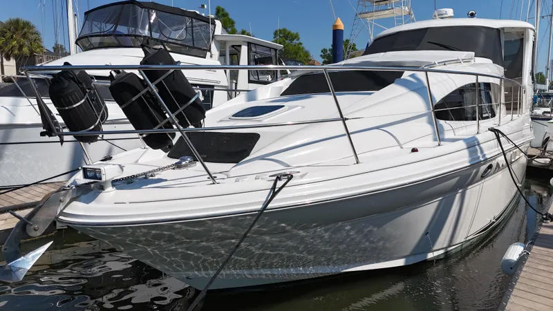 Debs Dinghy Yacht Photos Pics 2007 Sea Ray 40 Motor Yacht docked at marina, sleek white design.