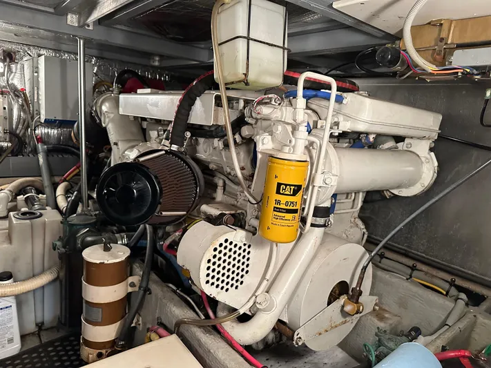  Yacht Photos Pics Engine room of a 2000 Mainship 43 Trawler Aft Cabin with CAT components.