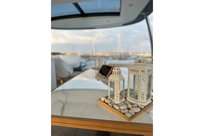  Yacht Photos Pics Luxurious 2023 Azimut Fly 78 yacht interior with elegant lantern decor.