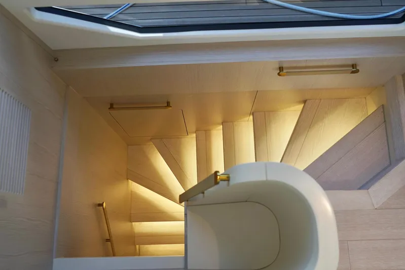  Yacht Photos Pics Elegant staircase with ambient lighting on 2023 Azimut Fly 78 yacht.