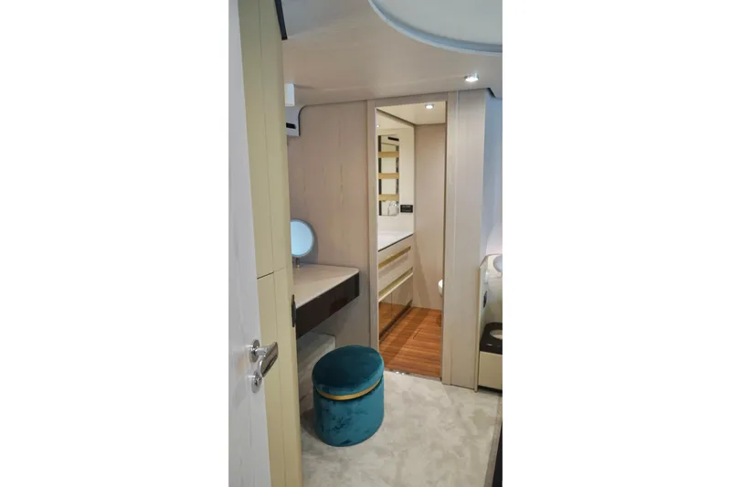 Yacht Photos Pics Luxurious interior of 2023 Azimut Fly 78 yacht with modern vanity and seating.
